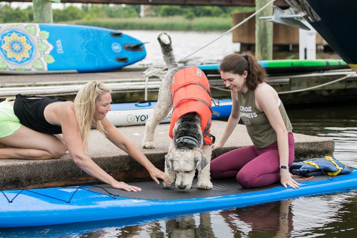 a woman sitting on a boat in the water