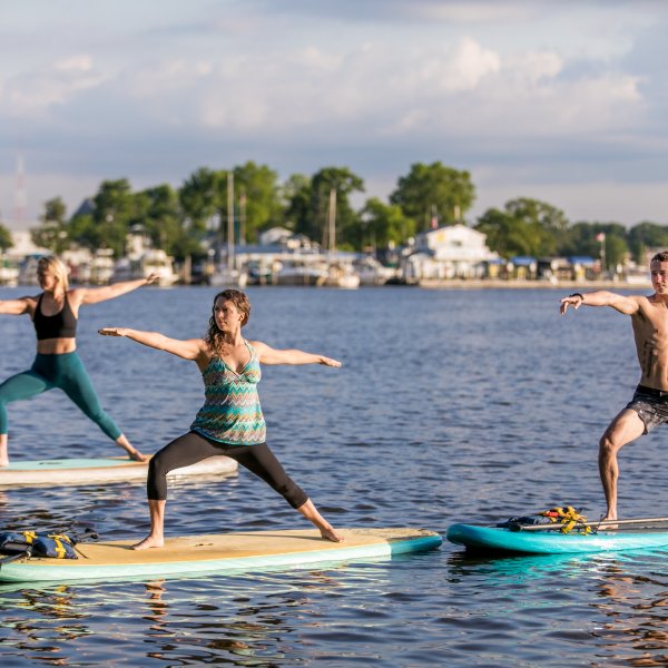 3 people doing SUP lesson