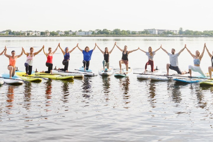a group of people in a body of water