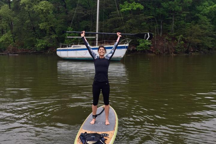 a man in a boat on a body of water